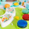 imageBright Starts Around We Go 2in1 Baby Walker Discovery Activity Center and Table Tropic Cool Ages 6 MonthsTropical Cool