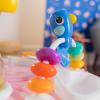 imageBright Starts Around We Go 2in1 Baby Walker Discovery Activity Center and Table Tropic Cool Ages 6 MonthsTropical Coral