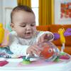 imageBright Starts Bounce Bounce Baby 2in1 Activity Center Jumper ampamp Table  Playful Pond Green 6 MonthsPlayful Palms