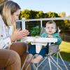 imageBright Starts Disney Baby Finding Nemo Pop n Dine Portable Highchair Suction Cup Nemo Toy Space Saving High Chair for IndoorOutdoor Dining with Fast Easy Compact Fold 6 Months  45 PoundsGray