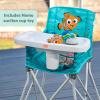 imageBright Starts Disney Baby Finding Nemo Pop n Dine Portable Highchair Suction Cup Nemo Toy Space Saving High Chair for IndoorOutdoor Dining with Fast Easy Compact Fold 6 Months  45 PoundsNemo