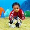 imageBright Starts Oball Rollin Rainstick Rattle EasyGrasp Toy Ages 3 Months Black  White Soccer Ball