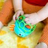 imageBright Starts Oball Rollin Rainstick Rattle EasyGrasp Toy Ages 3 Months Green Elephant