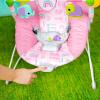 imageBright Starts Pink Paradise Portable Baby Bouncer with Vibrating Infant Seat and Toy Bar Max Weight 20 lbs Age 06 MonthsPink Paradise