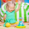 imageBright Starts Press ampamp Glow Spinner Cause and Effect Musical Baby Toy Age 6 MonthsPress  Grow