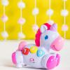 imageBright Starts Rock ampamp Glow Unicorn Crawling Baby Toy with Lights and Melodies Age 6 Months  Pink