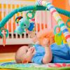imageBright Starts Wild Wiggles Baby Activity Gym ampamp Play Mat with FoldingToy bar Newborn and up  Green 185 x 291 x 291Green Wild Wiggles
